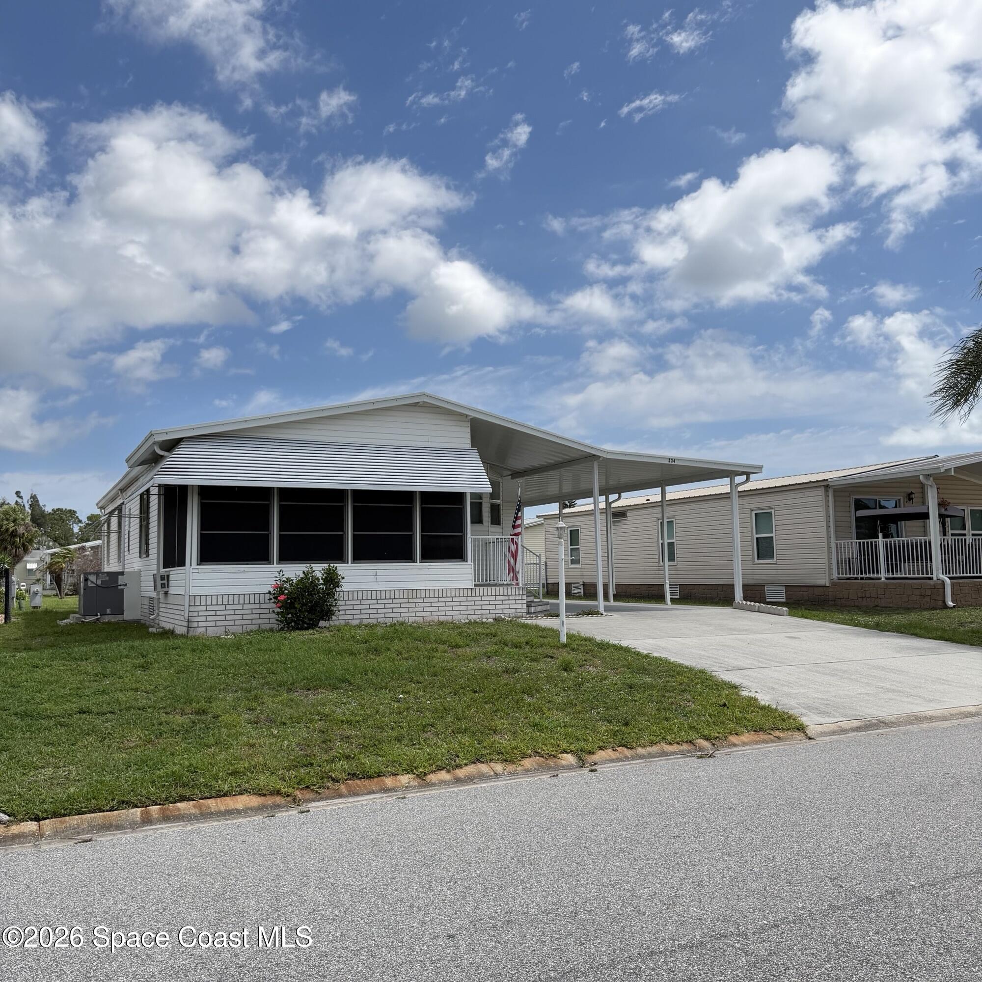 334 Macadamia Drive, Barefoot Bay, Fl 32976, FL