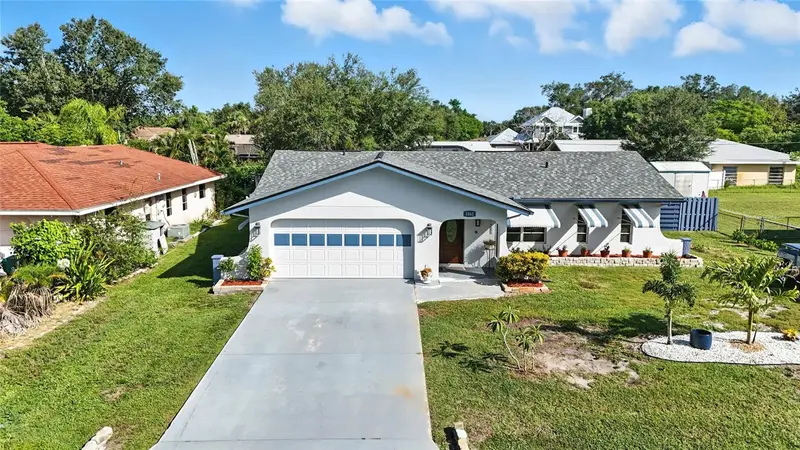 1042 Malay Ter Nw, FL