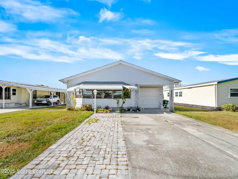1040 Waterway Drive, Barefoot Bay, Fl 32976, FL