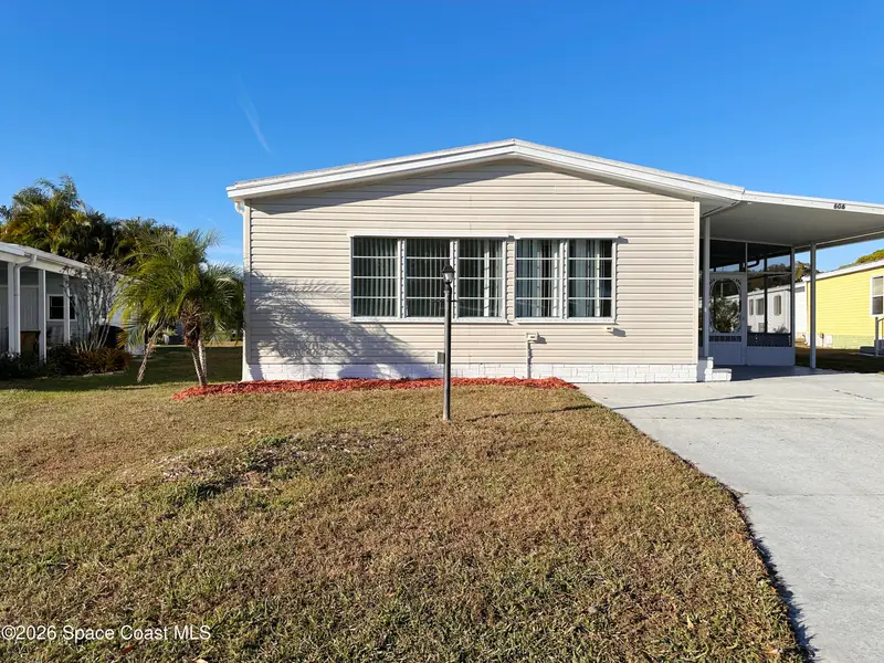 606 Dolphin Circle, Barefoot Bay, Fl 32976, FL